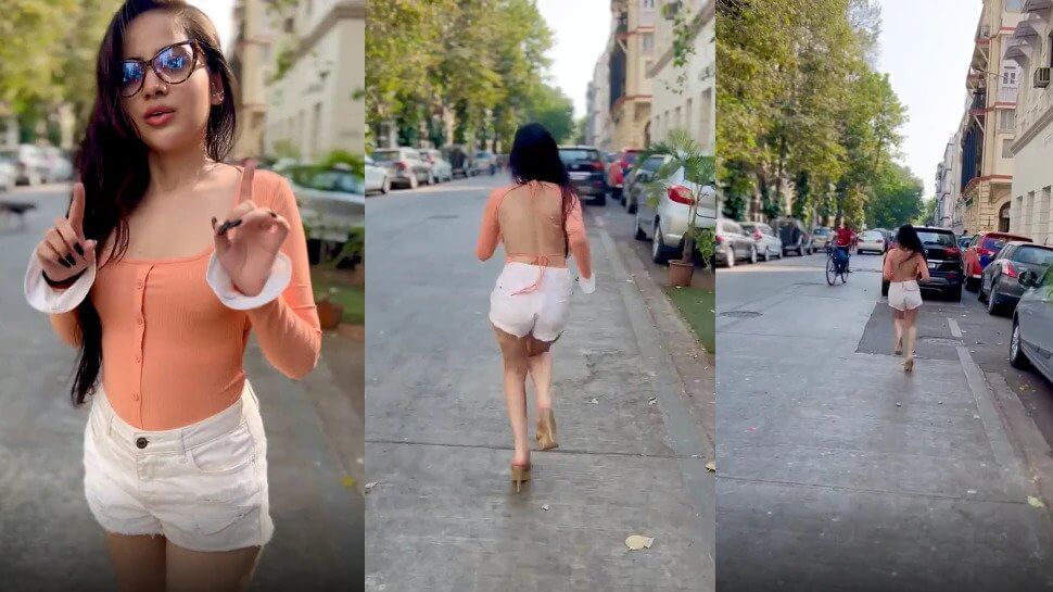 Urfi Javed runs in High Heels wearing a backless top through Mumbai streets